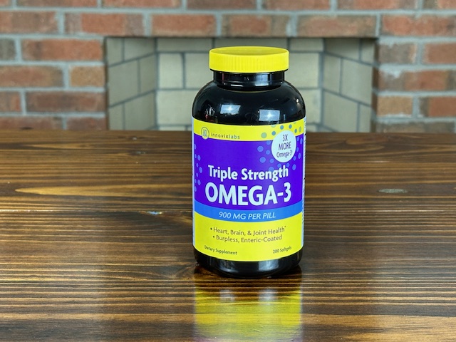 bottle of 900mg serving of omega 3 fatty acid supplement to reduce pain in knee osteoarthritis