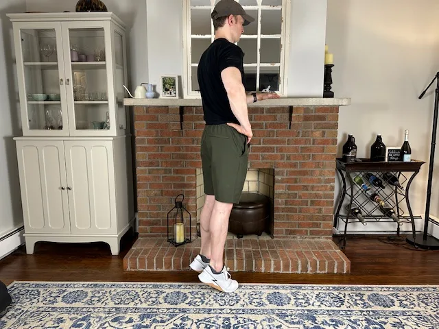 Heel and toe raises for knee stability in osteochondritis dissecans, demonstrated by a physical therapist