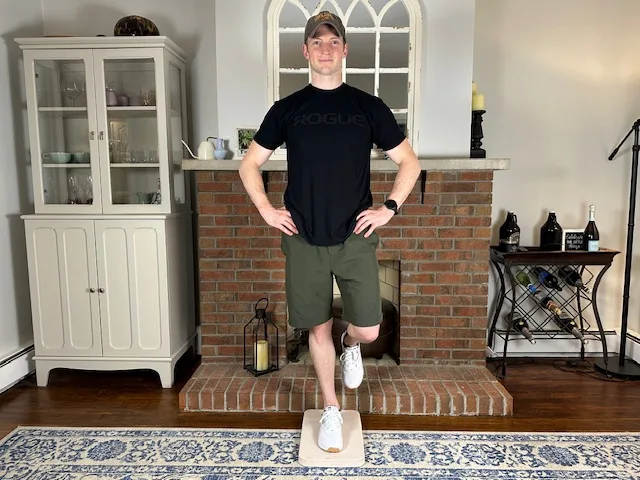 Single leg balance in front of counter for proprioception training after ACL injury